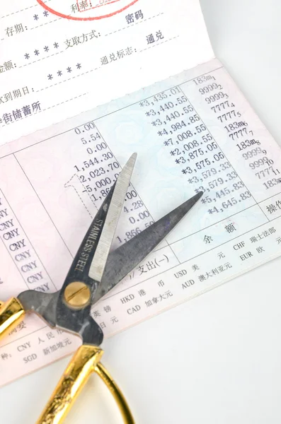 stock image Scissors and bankbook