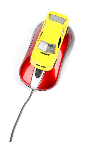 Speelgoed auto en computer muis — Stockfoto