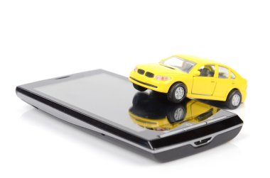 oyuncak araba ve akıllı telefon