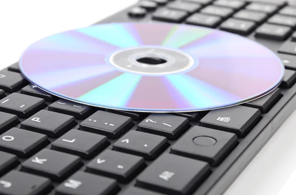 DVD e tastiera del computer — Foto Stock