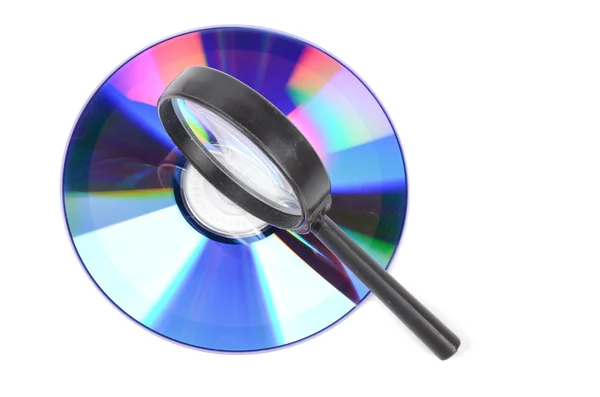 DVD and magnifier — Stock Photo, Image