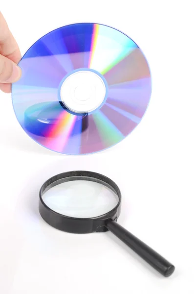 DVD och förstoringsglas — Stockfoto