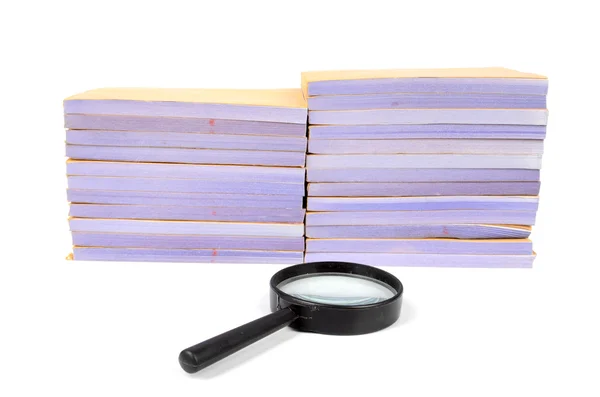Documents and magnifier — Stock Photo, Image
