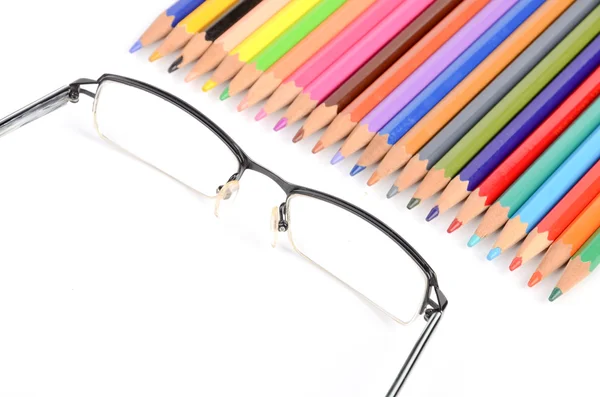 Lápis e óculos de cor — Fotografia de Stock