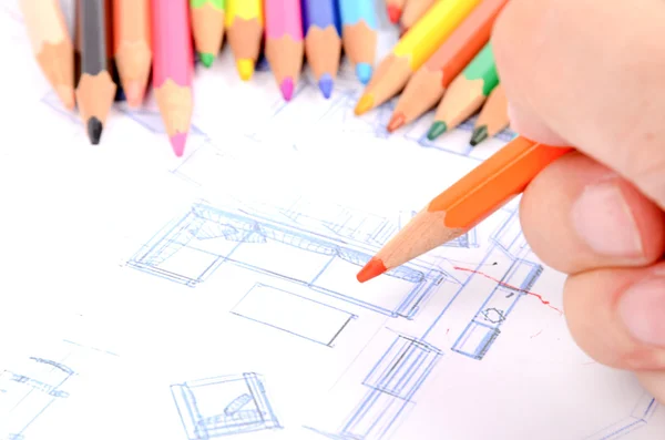 Color pencils and house blueprint — Stock Photo, Image