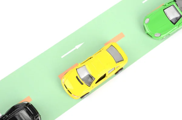 Spielzeugautos auf der Straße — Stockfoto