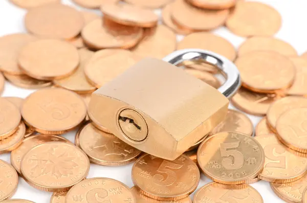 Padlock and coins — Stock Photo, Image