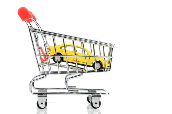 Carro de compras y coche de juguete — Foto de Stock