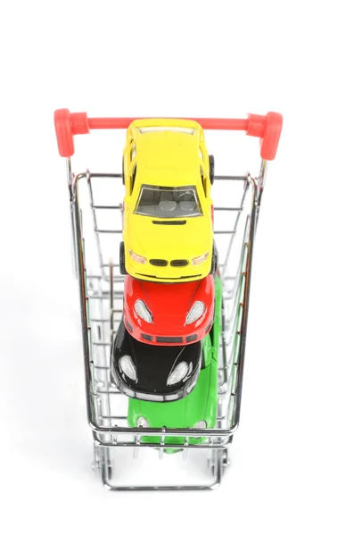 Корзина и игрушечный автомобиль — стоковое фото
