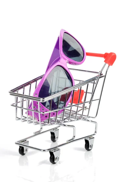 Shopping cart and sunglasses — Stock Photo, Image