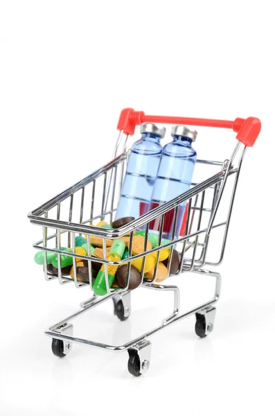 Shopping cart and medicine — Stock Photo, Image