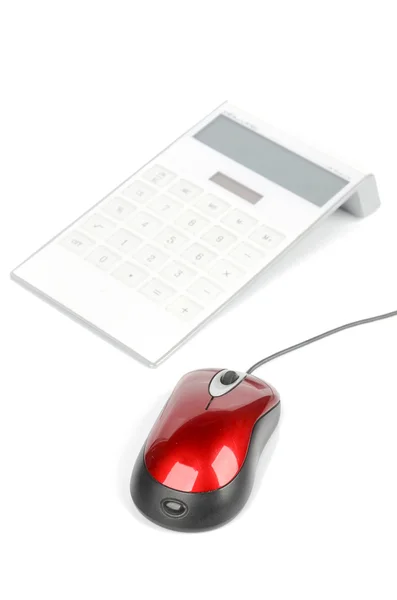 コンピューターのマウスと電卓 — ストック写真