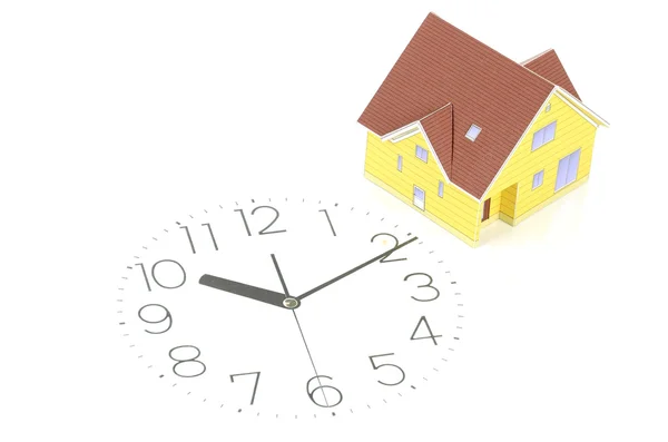 stock image Model house on clock face