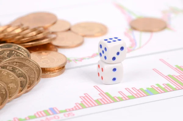 Dice and coin on stock report — Stock Photo, Image