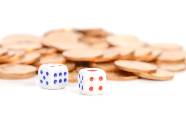 Dice and coins on white background — Stock Photo, Image