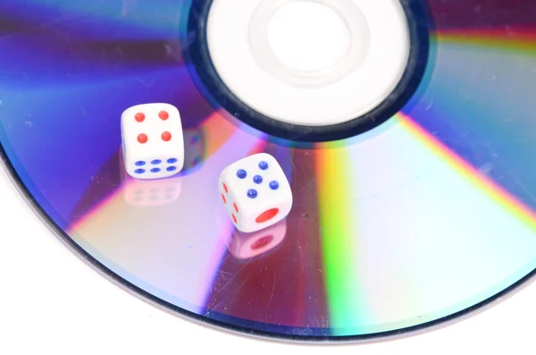 DVD and dices on white background — Stock Photo, Image
