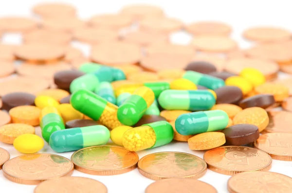 Coin and medicine — Stock Photo, Image