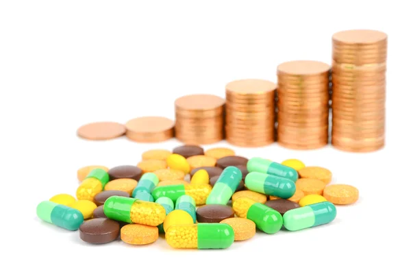 Coin and medicine — Stock Photo, Image