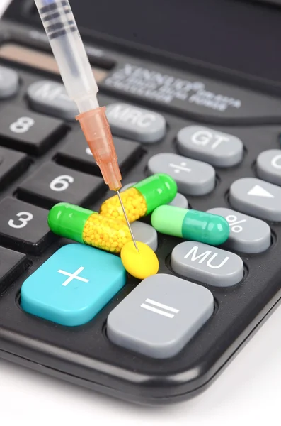 Medycyna i kalkulator — Zdjęcie stockowe