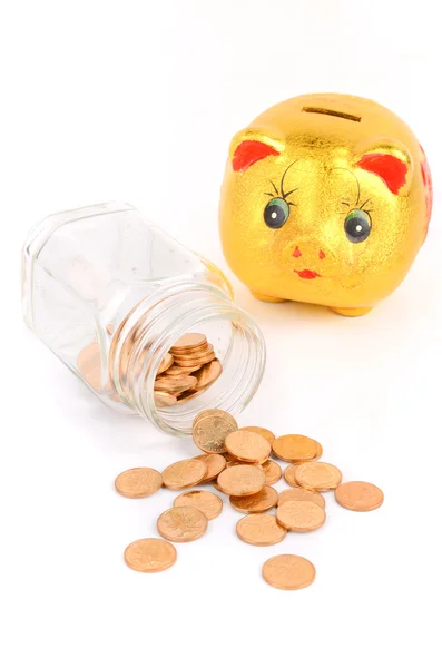 Um pote de dinheiro e um banco porquinho — Fotografia de Stock