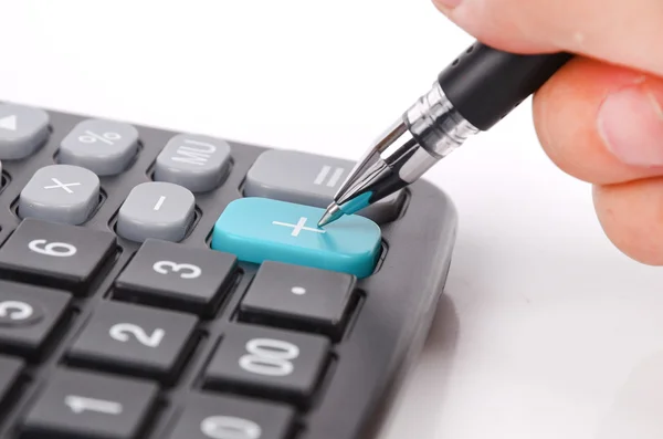 Calculadora e caneta — Fotografia de Stock