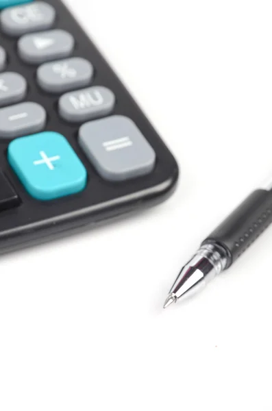 Calculator and pen — Stock Photo, Image