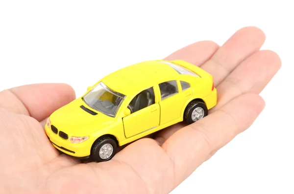 Zabawki samochodu w ręku — Zdjęcie stockowe