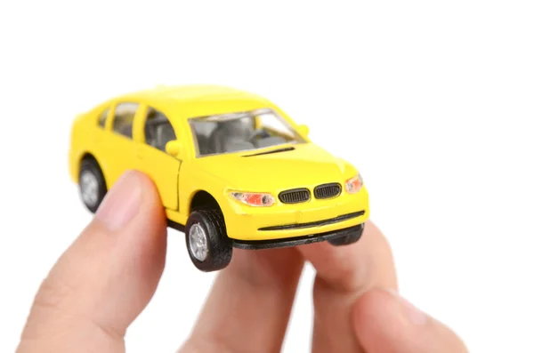 Speelgoed auto in de hand — Stockfoto