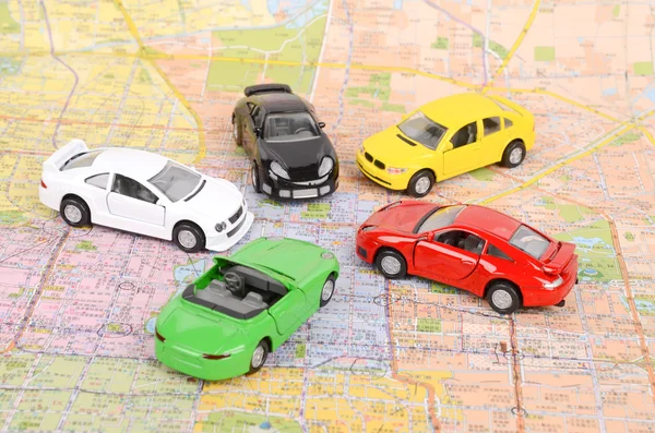 Carro de brinquedo e mapa — Fotografia de Stock