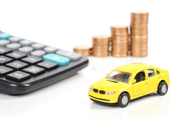 Calculator,coins and toy car — Stock Photo, Image