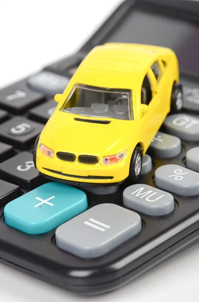 Calculadora y coche de juguete — Foto de Stock
