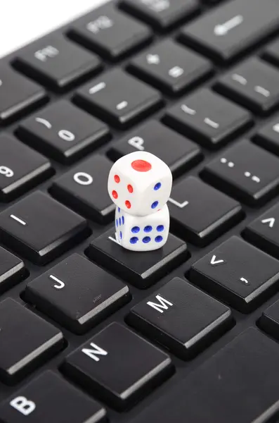 Stock image Keyboard and dices