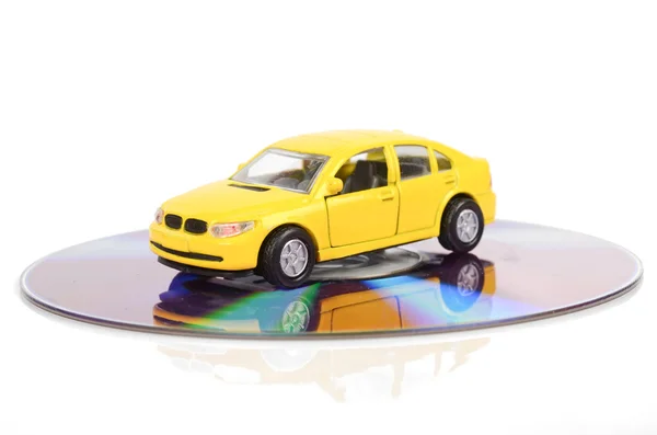 Carro de brinquedo e DVD — Fotografia de Stock