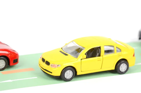 Іграшковий автомобіль на дорозі — стокове фото
