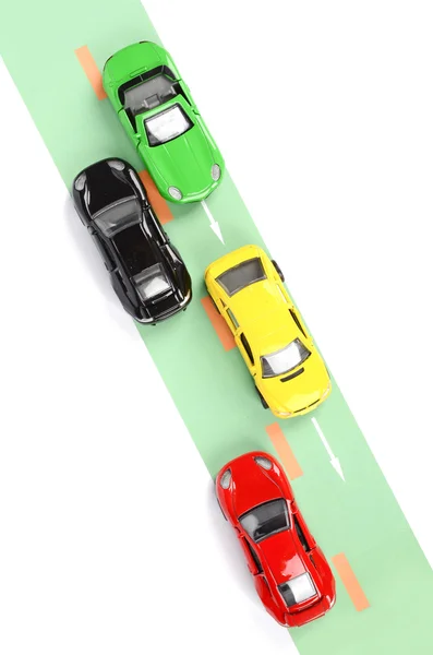 Carro de brinquedo na estrada — Fotografia de Stock