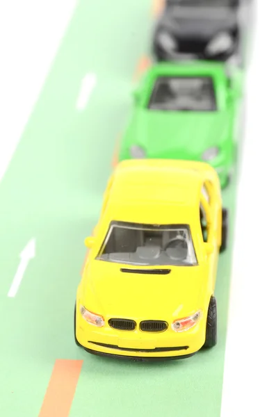 Speelgoedauto op weg — Stockfoto
