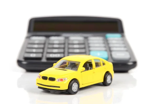 Калькулятор и игрушечный автомобиль Лицензионные Стоковые Фото