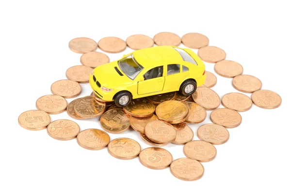 Spielzeugauto und Münzen — Stockfoto
