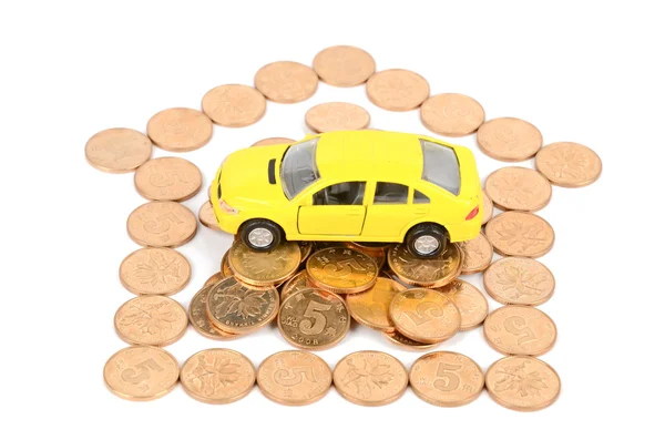 Carro de brinquedo e moedas — Fotografia de Stock