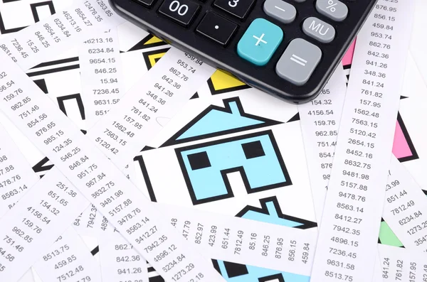 Receipts,calculator and house — Stock Photo, Image