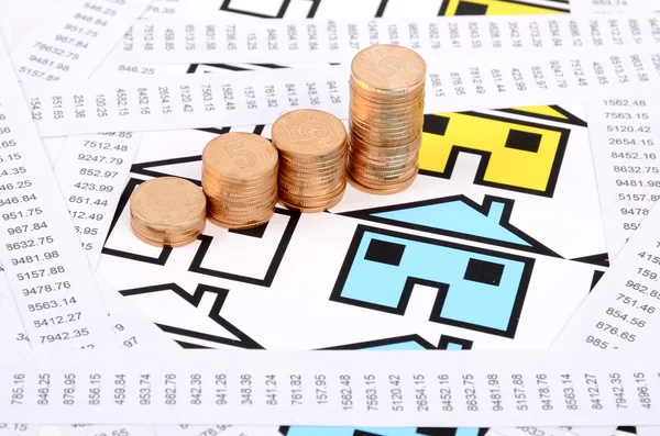 Bevételek, az érmék és a ház játékautó — Stock Fotó