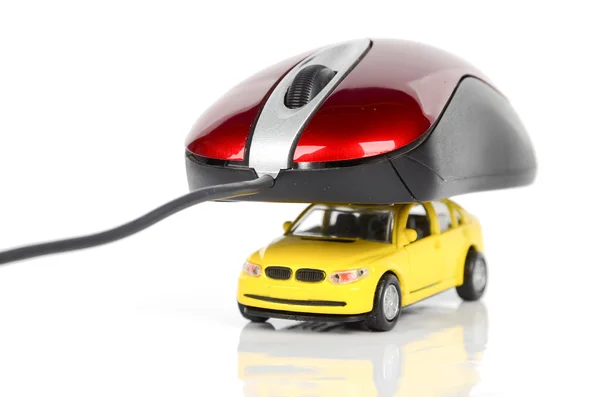 Speelgoed auto en computer muis — Stockfoto