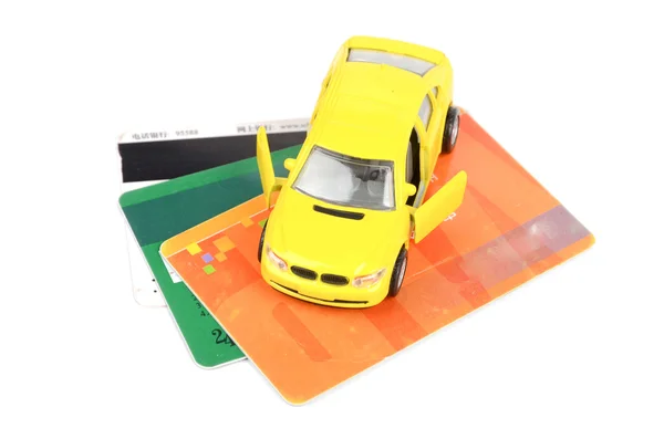 Carro de brinquedo e cartão de crédito — Fotografia de Stock