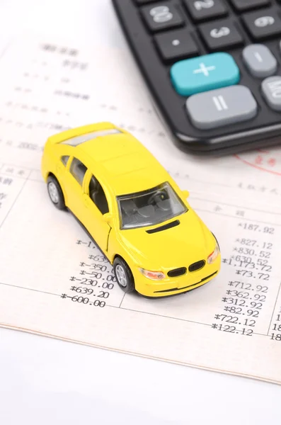 Toy car and calculator — Stock Photo, Image