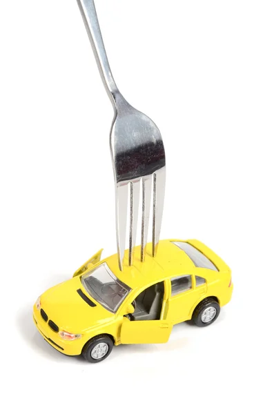 Toy car and fork — Stock Photo, Image