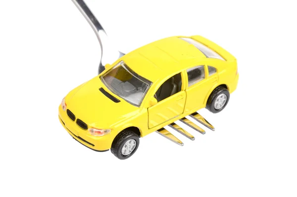 Leksaksbil och gaffel — Stockfoto