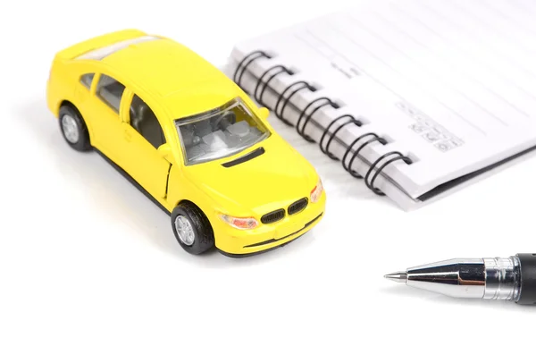 Toy car,pen and notepad — Stock Photo, Image
