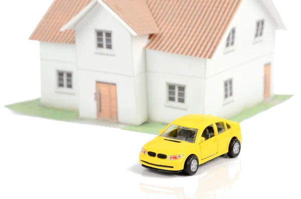 Toy car and house on white background — Stock Photo, Image