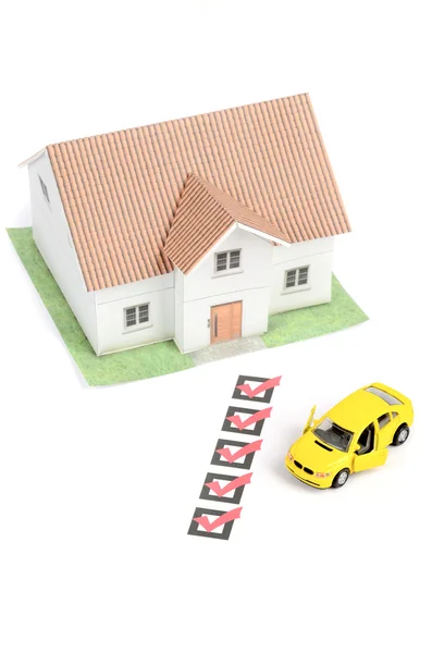 Check box and car with house — Stock Photo, Image