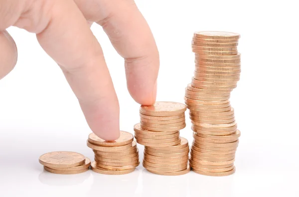 Finger and coins — Stock Photo, Image